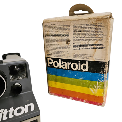 Camara Polaroid The Button